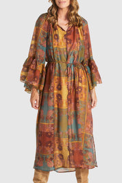 A model wearing the Bohemian Lyocell Dress in colour Floral, from the front, cropped image