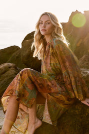 A model wearing the Bohemian Lyocell Dress in colour Floral, from the front, showing the whole outfit