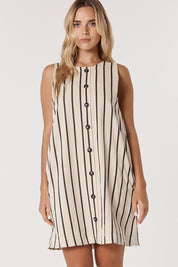 A model wearing the Luna Cotton Blend Dress in colour Creamblack, from the front, cropped image