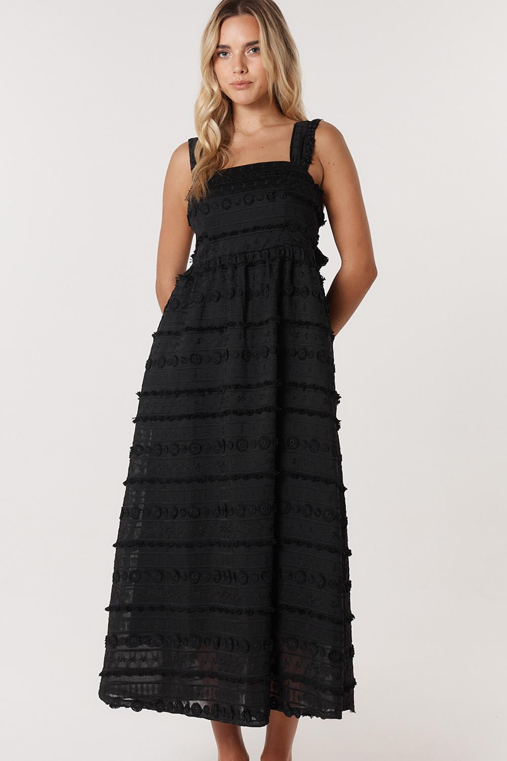 A model wearing the Sierra Lyocell Blend Lace Dress in colour Black (Black), from the front, showing the whole outfit