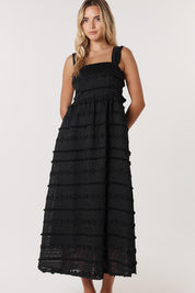 A model wearing the Sierra Lyocell Blend Lace Dress in colour Black (Black), from the front, showing the whole outfit