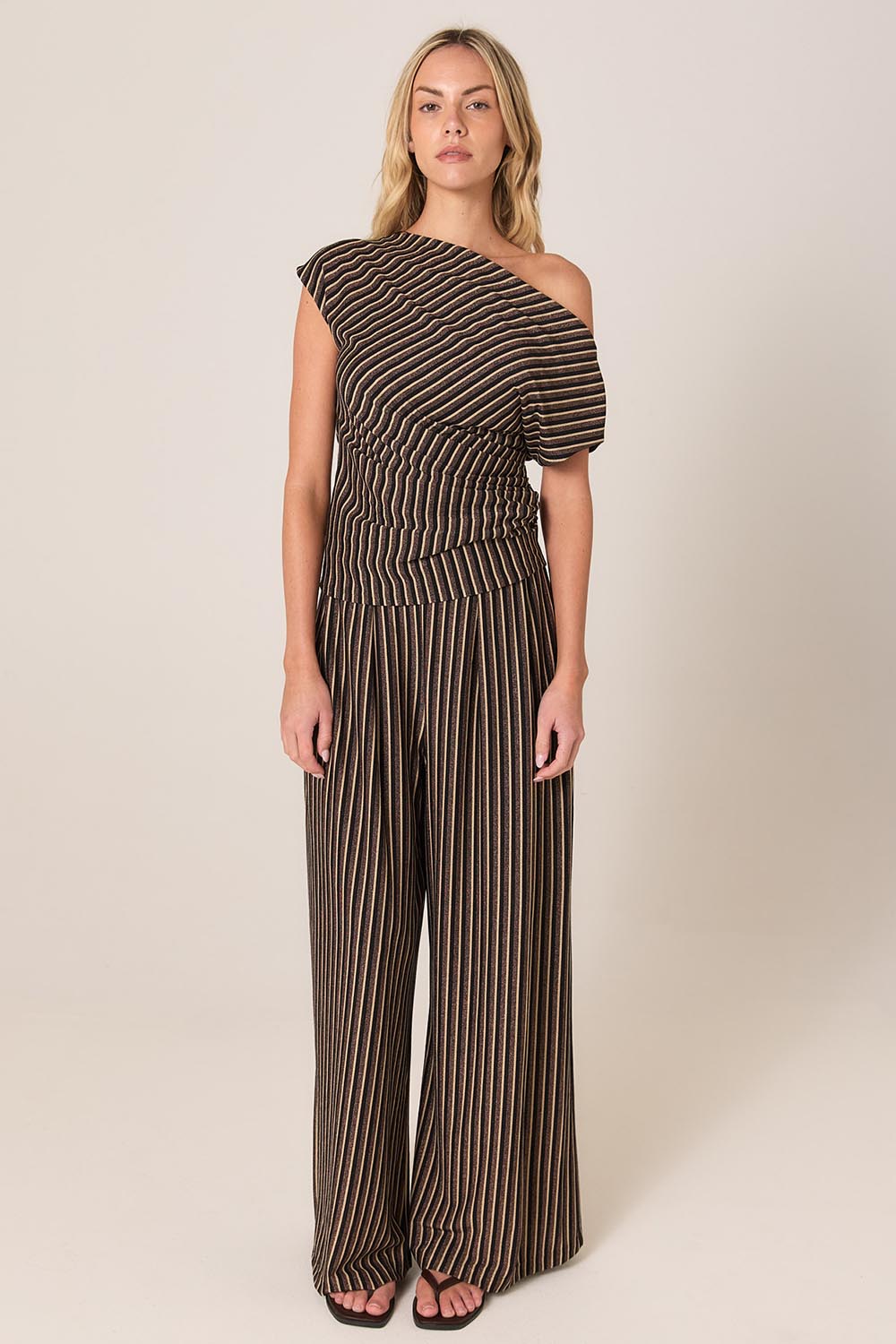 A model wearing the Everlyn Jersey Pant in colour Multi, from the front, showing the whole outfit