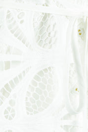 Product shot of the Elara Broderie Shirt Dress in colour Ivory (White), detail