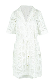 Product shot of the Elara Broderie Shirt Dress in colour Ivory (White), from the front
