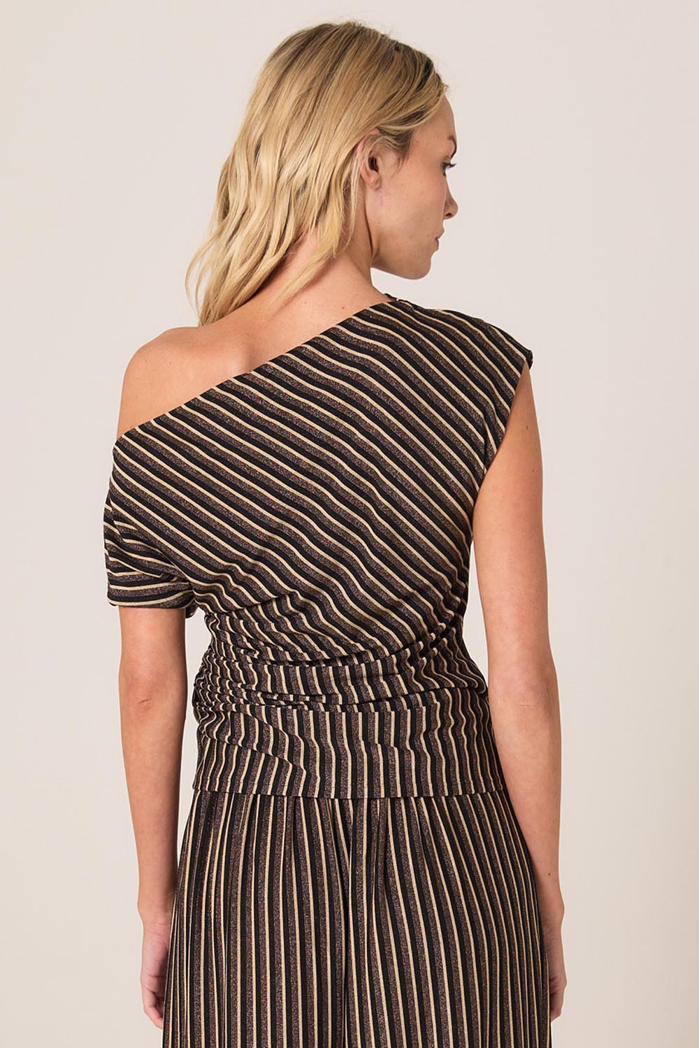 A model wearing the Everlyn Jersey Top in colour Multi, from the back