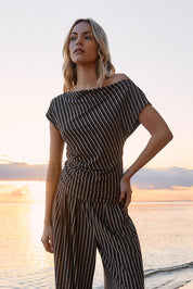 A model wearing the Everlyn Jersey Top in colour Multi, from the front, showing the whole outfit