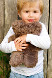 A model wearing the Flatout Bears in colour Chocolate, from the front, showing the whole outfit
