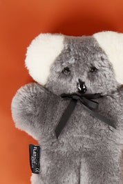 A model wearing the Flatout Bears in colour Koala (Blue), from the front, showing the whole outfit