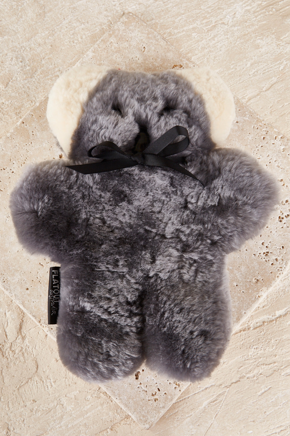 A model wearing the Flatout Bears in colour Koala (Blue), from the front, showing the whole outfit