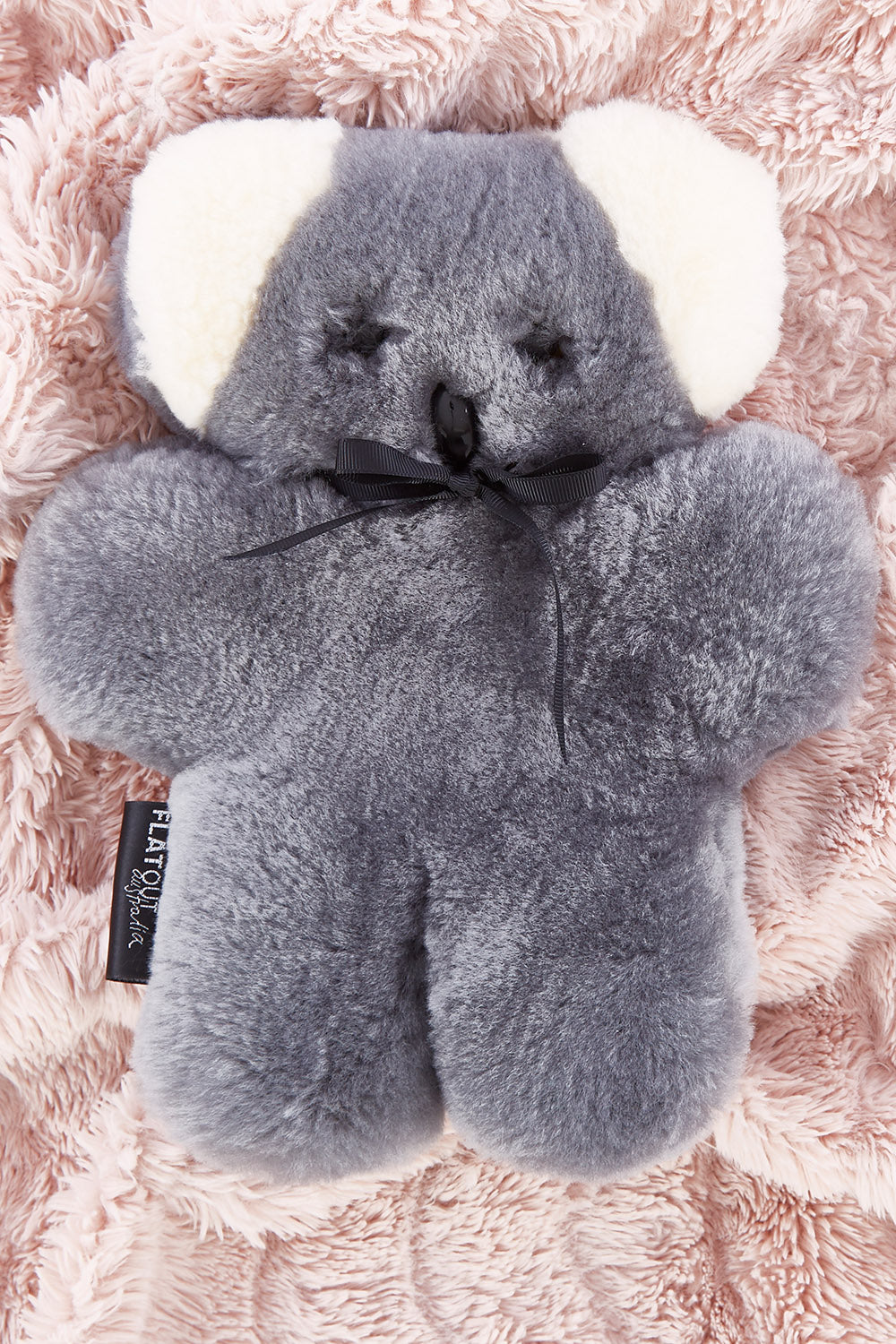 A model wearing the Flatout Bears in colour Koala (Blue), from the front, showing the whole outfit