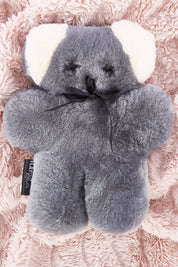A model wearing the Flatout Bears in colour Koala (Blue), from the front, showing the whole outfit