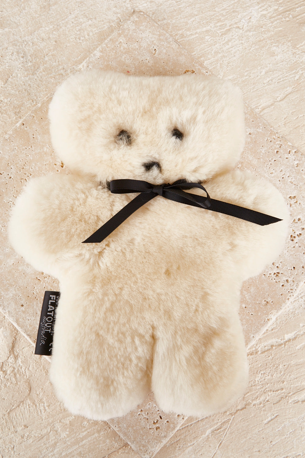 A model wearing the Flatout Bears in colour Milk (White), from the front, showing the whole outfit