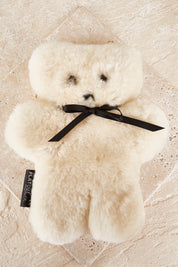 A model wearing the Flatout Bears in colour Milk (White), from the front, showing the whole outfit