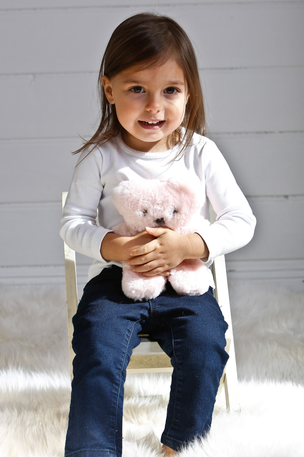A model wearing the Flatout Bears in colour Rose (Pink), from the front, showing the whole outfit