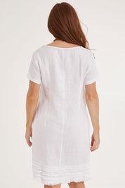 Model Sally wearing size 10 of the Frilled Hem Linen Dress in colour White (White), from the back