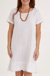 Model Sally wearing size 10 of the Frilled Hem Linen Dress in colour White (White), from the front, cropped image