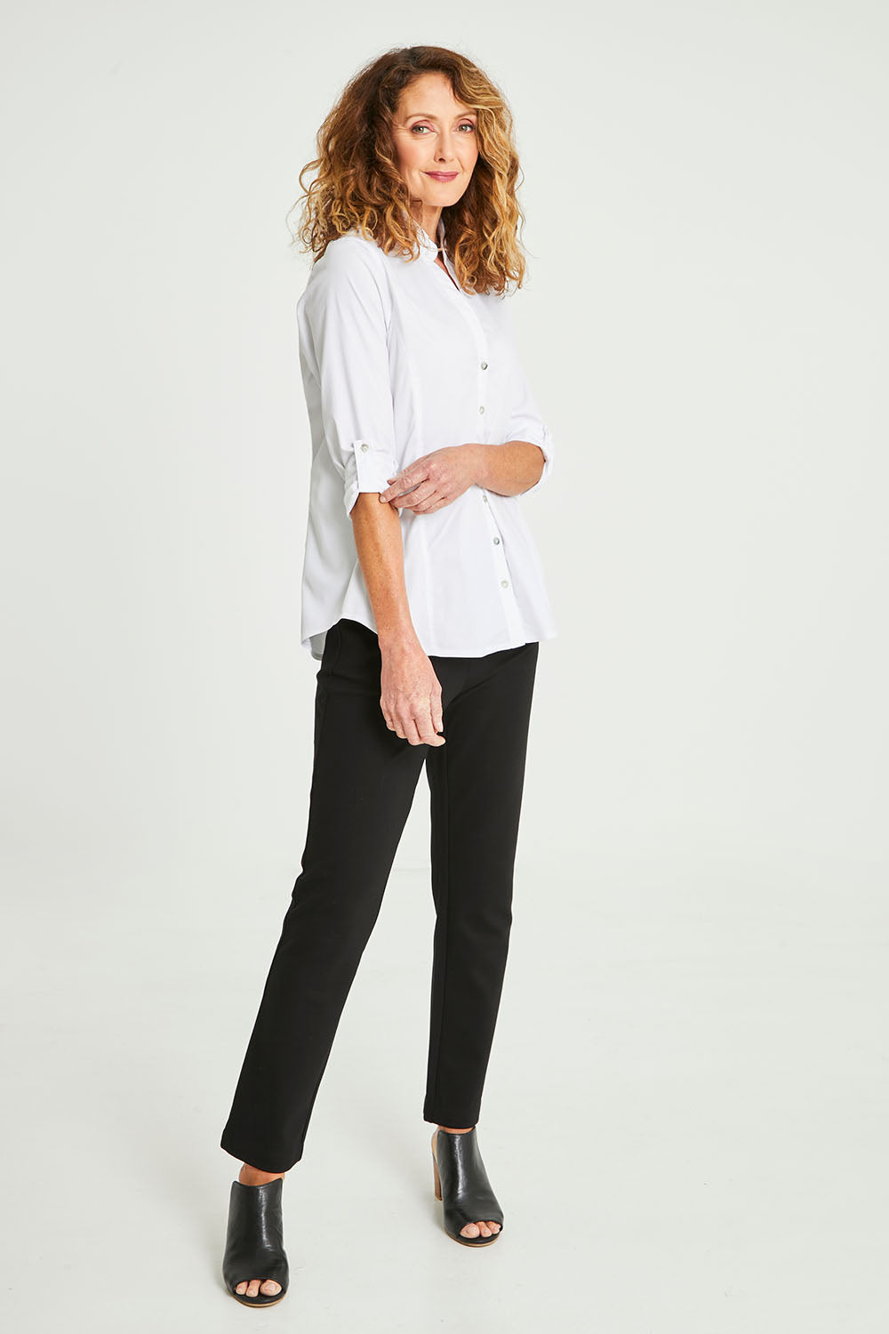 Model Emma wearing size 10 of the Emma Rib Detail Shirt in colour White (White), from the front, showing the whole outfit