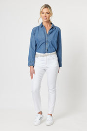 A model wearing the Denim Shirt in colour Denim (Blue), from the front, showing the whole outfit