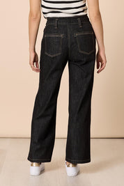 Model Genericm wearing size sample of the Hudson Wide Leg Jean - Black in colour Black, from the back