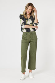 A model wearing the Hudson Wide Leg Jean in colour Khaki (Green), from the front, showing the whole outfit
