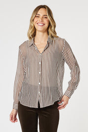 A model wearing the City Stripe Shirt in colour Chocolate, from the front, cropped image