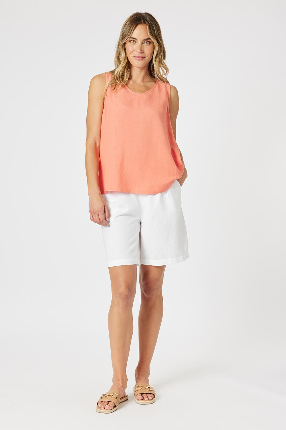 A model wearing the Lino Linen Blend Shorts in colour White (White), from the front, showing the whole outfit