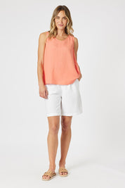 A model wearing the Lino Linen Blend Shorts in colour White (White), from the front, showing the whole outfit