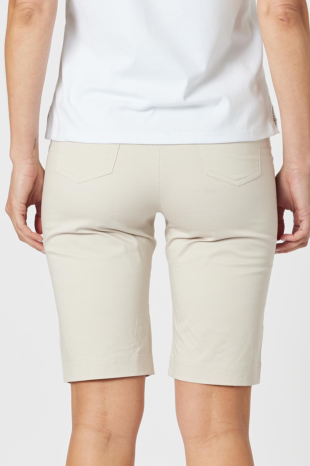 A model wearing the San Marino Cotton Shorts in colour Natural, from the back