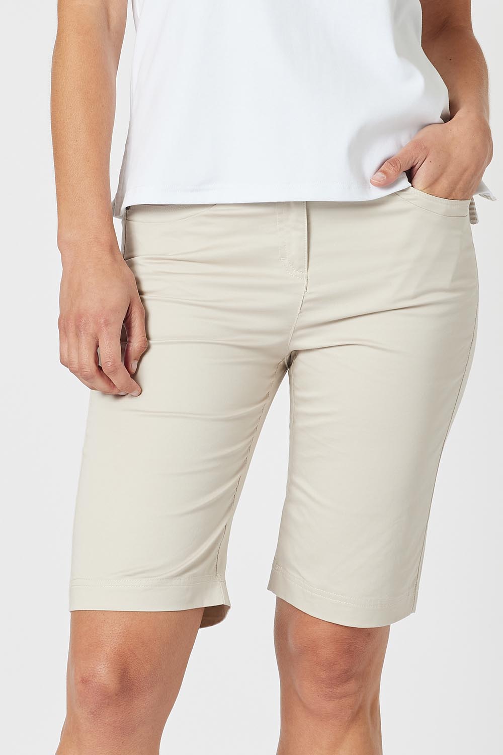A model wearing the San Marino Cotton Shorts in colour Natural, from the front, cropped image