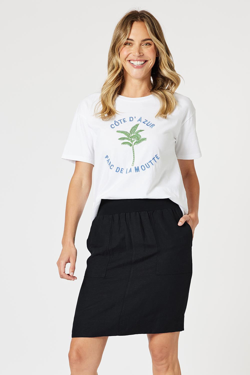 A model wearing the Lino Linen Blend Skirt in colour Black (Black), from the front, cropped image