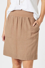 A model wearing the Lino Linen Blend Skirt in colour Nutmeg, from the front, cropped image