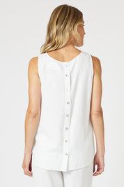 A model wearing the Lino Linen Blend Button Back Cami in colour White (White), from the back