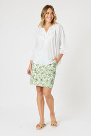 A model wearing the Coastal Embroidered Cotton Top in colour White (White), from the front, showing the whole outfit