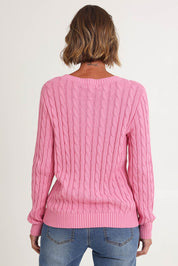 Model Riina wearing size S of the Hampton Cable Knit Jumper in colour Pink (Pink), from the back