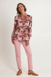 Model Riina wearing size 10 of the Dakota Print Shirt in colour Blush (Pink), from the front, showing the whole outfit
