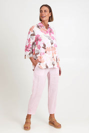 Model Riinar wearing size 10 of the Amalfi Rose Print Shirt – Pinkmulti in colour Pinkmulti, from the front