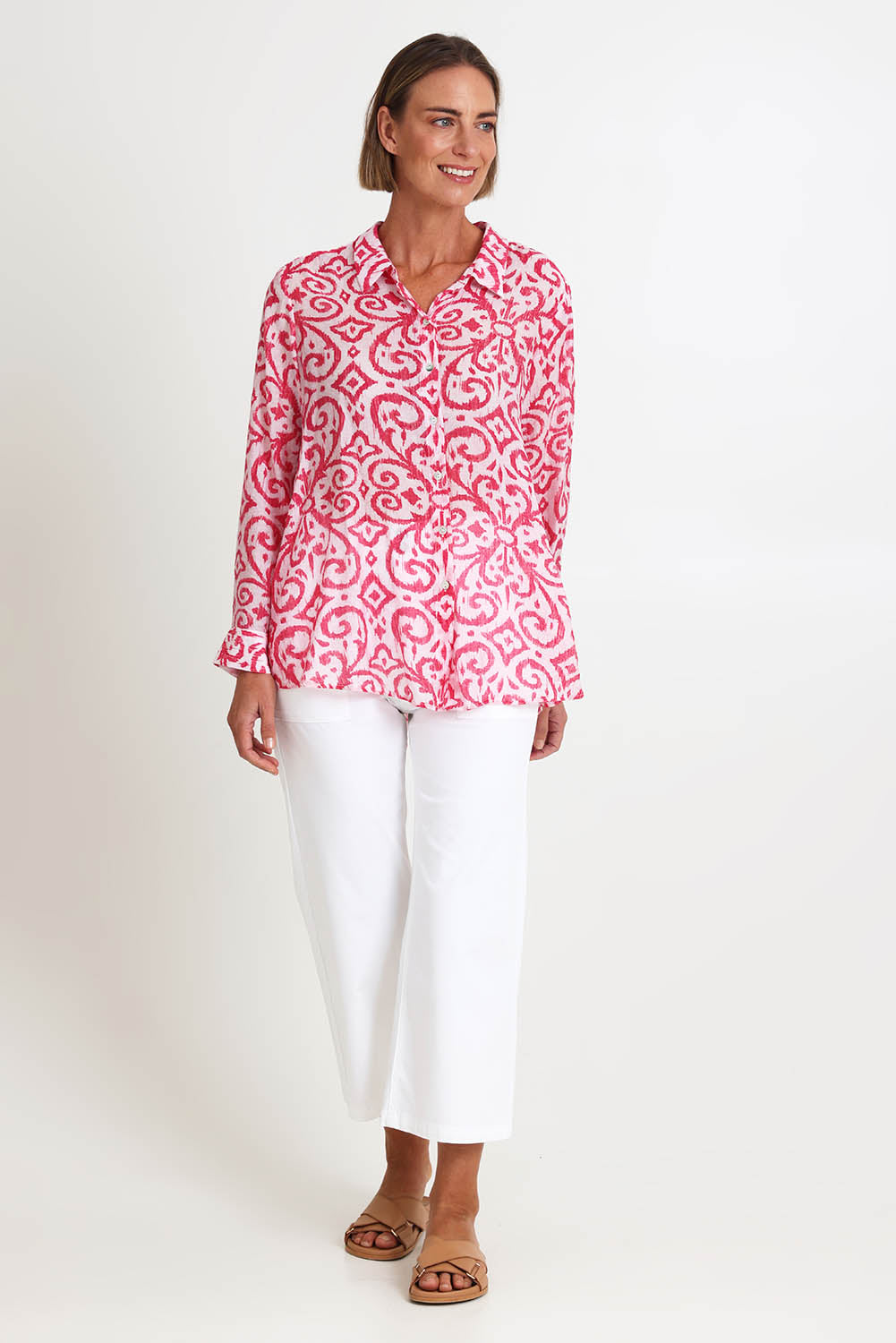 Model Riinar wearing size 10 of the Provence Print Shirt – Raspberry in colour Raspberry, from the front