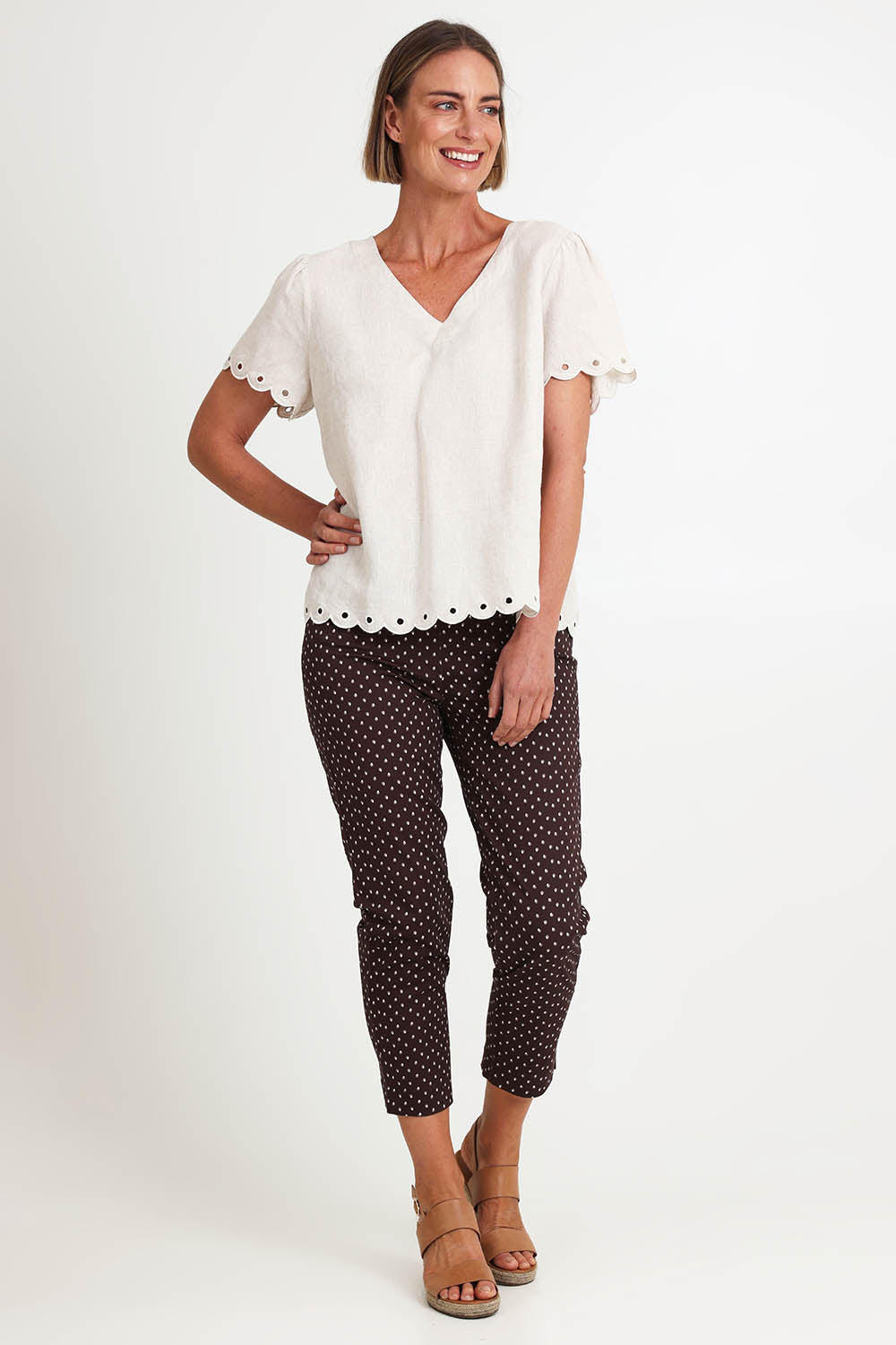 Model Riinar wearing size 10 of the Lilly Linen Top – Natural in colour Natural, from the front
