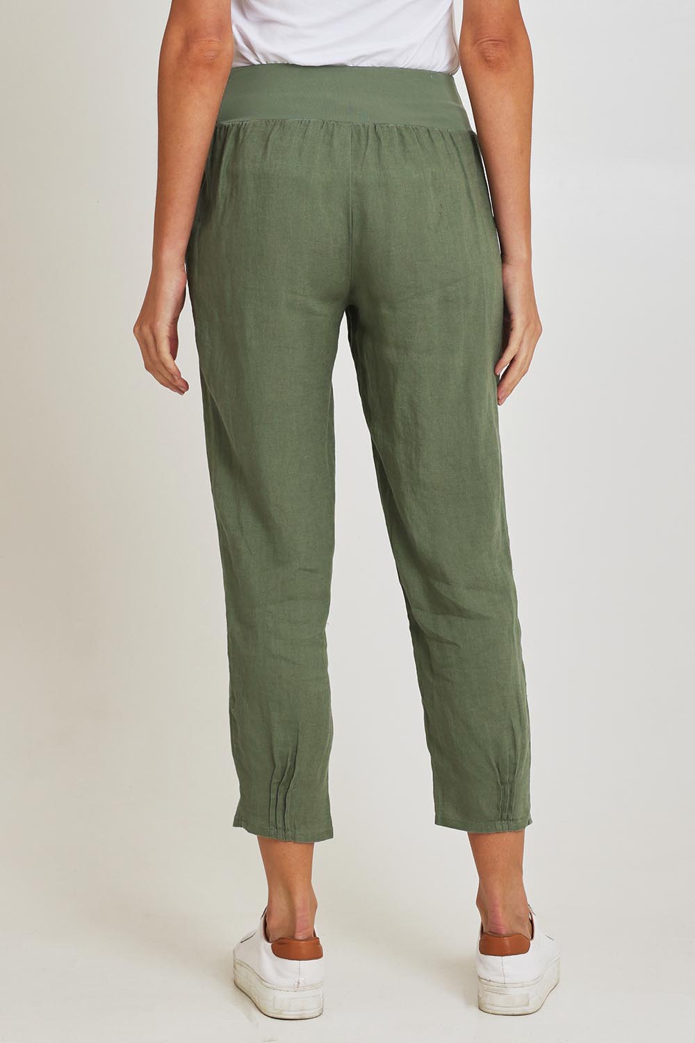Model Madeline wearing size 10 of the Pull On Linen Pant in colour Khaki (Green), from the back