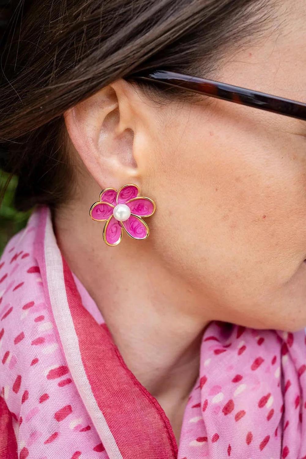 Model Genericm wearing size sample of the Bronte Flower Stud Earring - Darkpink in colour Darkpink, from an angle