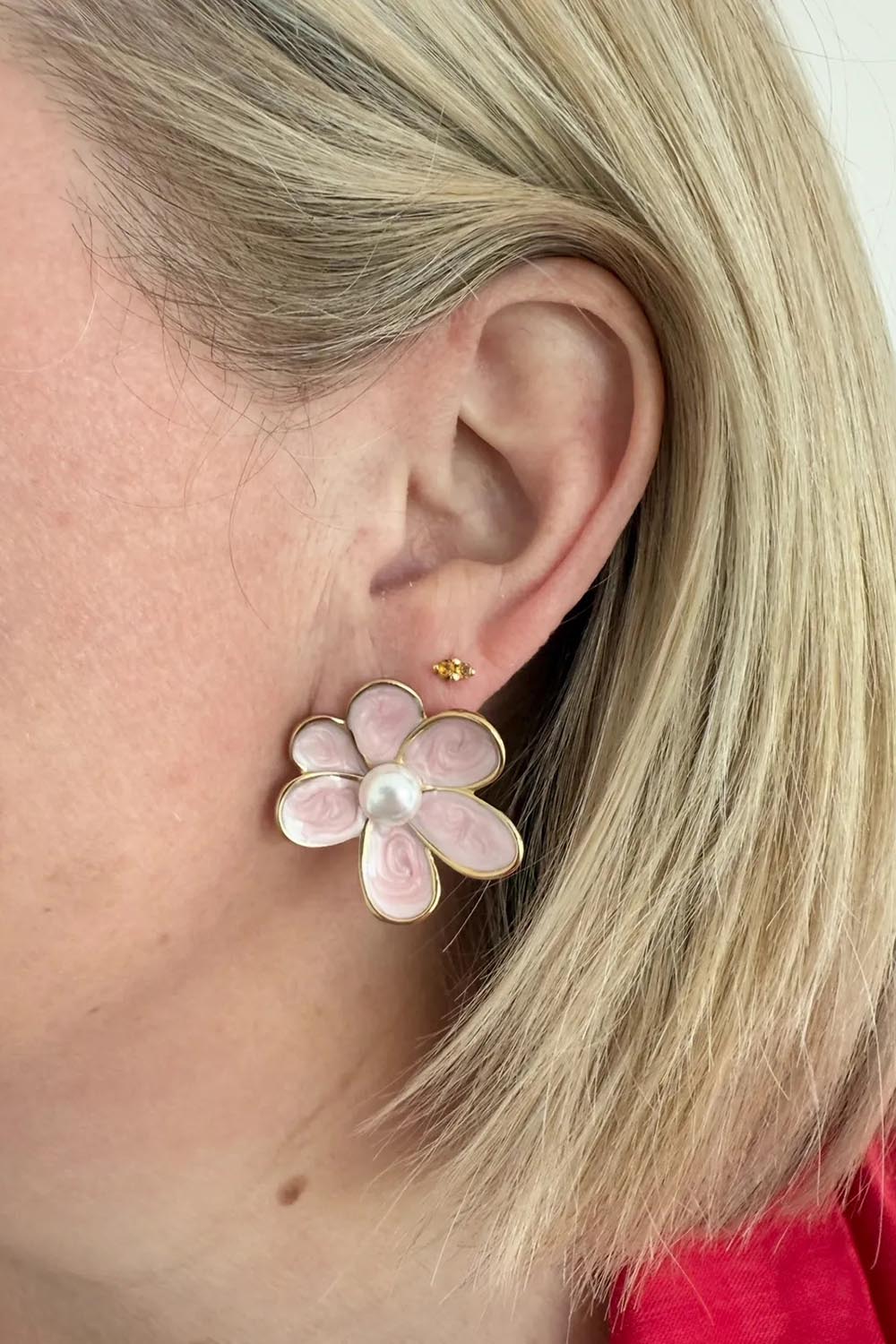 Model Genericm wearing size sample of the Bronte Flower Stud Earring - Lightpink in colour Lightpink, from an angle