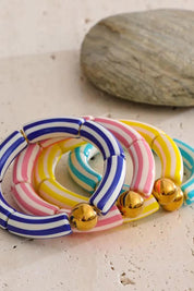 Product shot of the Candy Stripe Stretch Bracelet - Navy in colour Navy, from the front