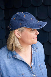 Model Genericm wearing size sample of the Embroidered Cap - Dacshundnavy in colour Dacshundnavy, from an angle