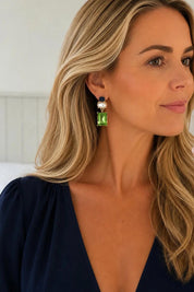 Model Genericm wearing size sample of the Matilda Geometric Crystal Earring - Navygreen in colour Navygreen, from an angle