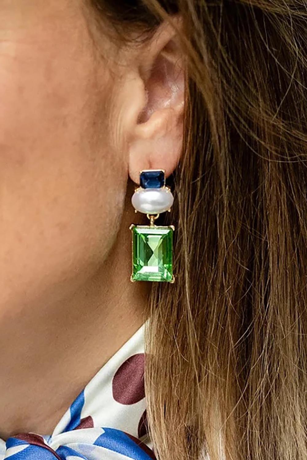 Model Genericm wearing size sample of the Matilda Geometric Crystal Earring - Navygreen in colour Navygreen, from an angle
