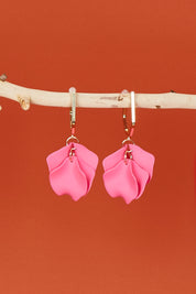 A model wearing size OneSize of the Medium Drop Multi Leaf Earring in colour Pink (Pink), from the front, showing the whole outfit