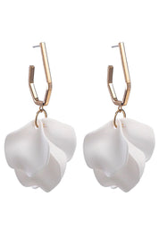 A model wearing the Medium Drop Multi Leaf Earring in colour White (White), from the front, showing the whole outfit