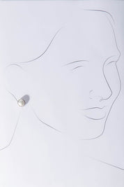 A model wearing size OneSize of the Bezel Set Pearl Stud in colour Silver (Metallics), from the front, showing the whole outfit