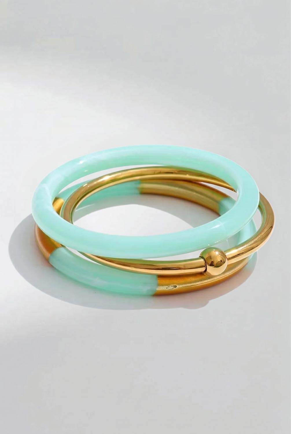 Product shot of the Riviera 3 Stack Bangle - Aqua in colour Aqua, from the front