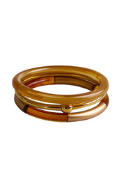 Product shot of the Riviera 3 Stack Bangle - Bronze in colour Bronze, from the front